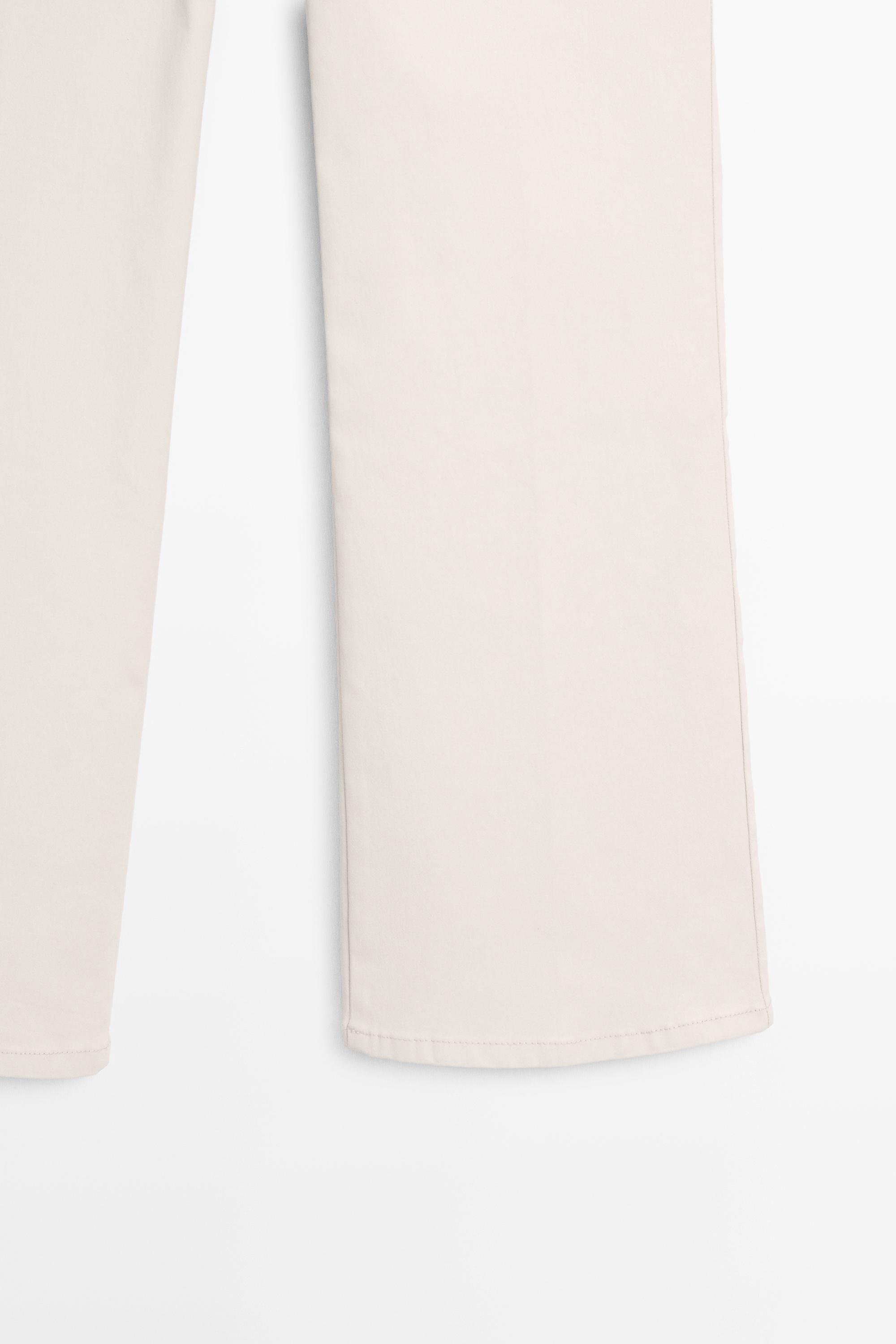 Mid-waist waxed flared pants